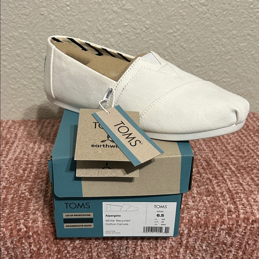 TOMS Classic White Canvas Slip-Ons